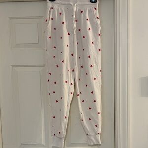 White Joggers with Red Heart Print.        K